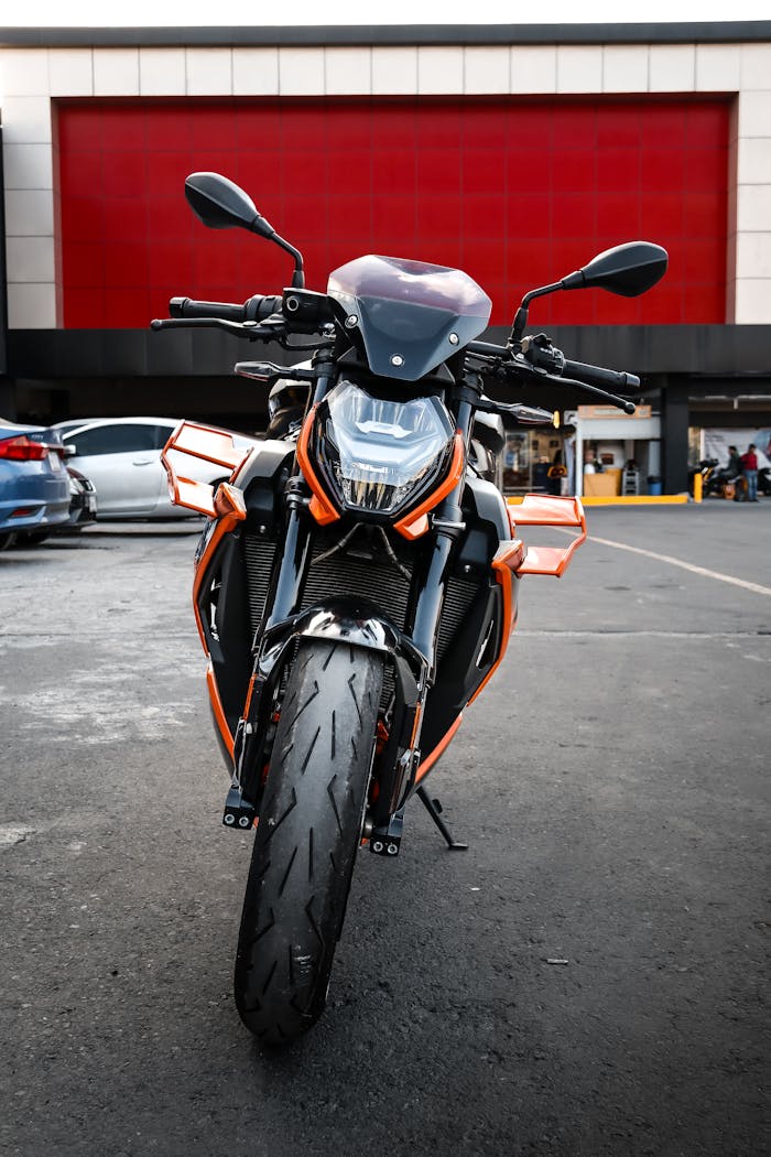 Dynamic front view of a modern sport motorcycle in an urban environment.