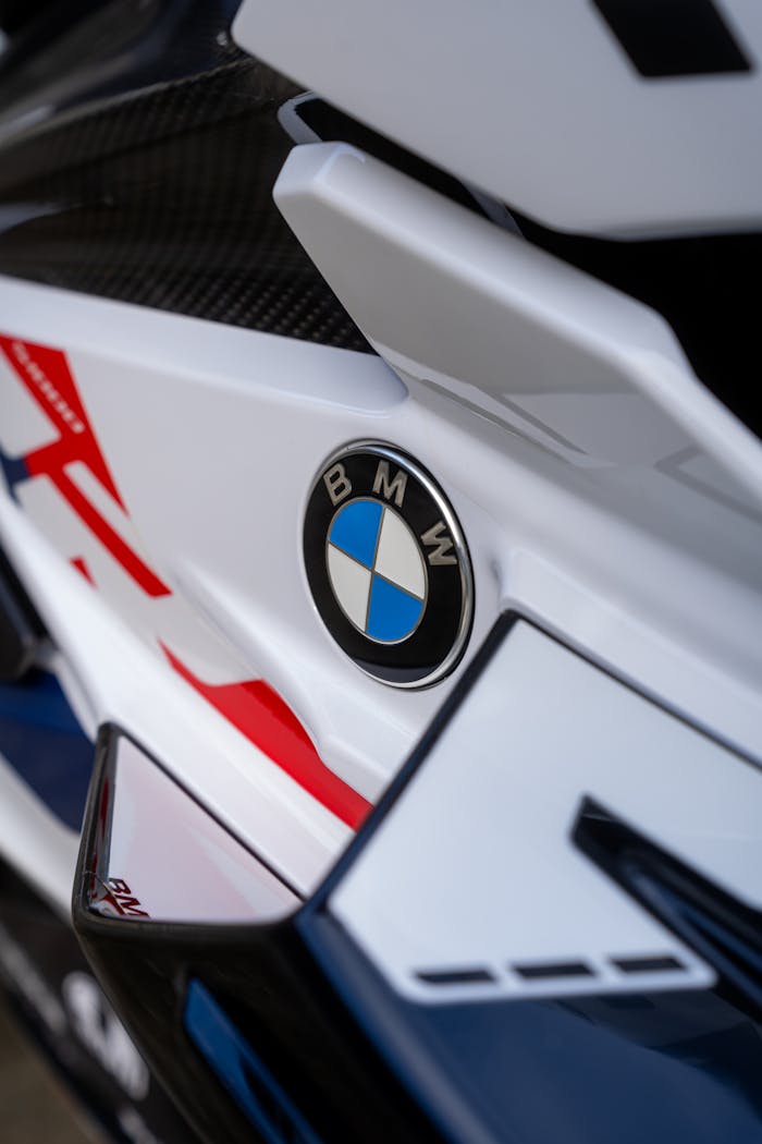 Detailed view of a sporty motorcycle with bold graphics and sleek design.